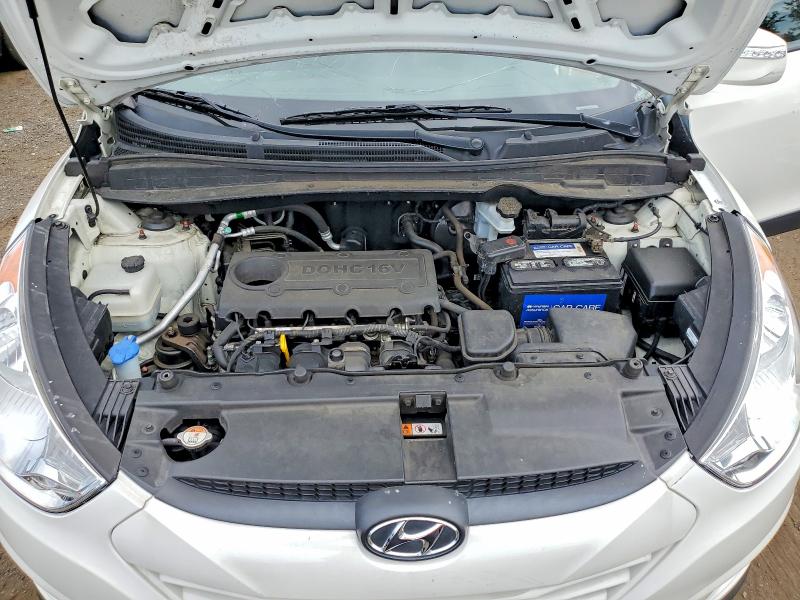 Снимка 12 от търг – 2013 HYUNDAI TUCSON с VIN KM8JUCACXDU712044