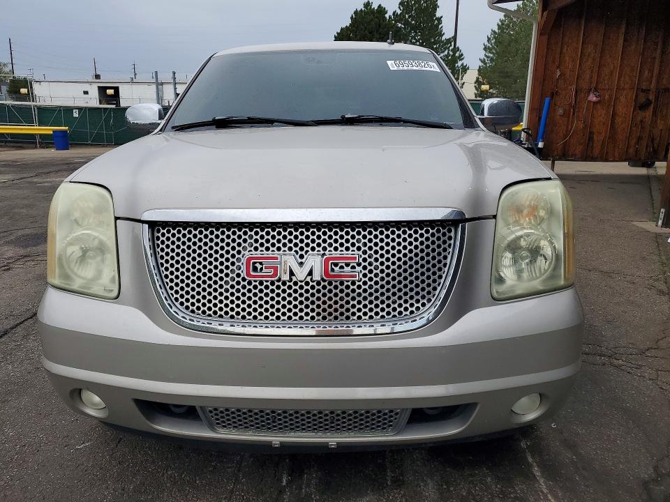 Photo 5 from auction – 2007 GMC YUKON with VIN 1GKFK63887J237997