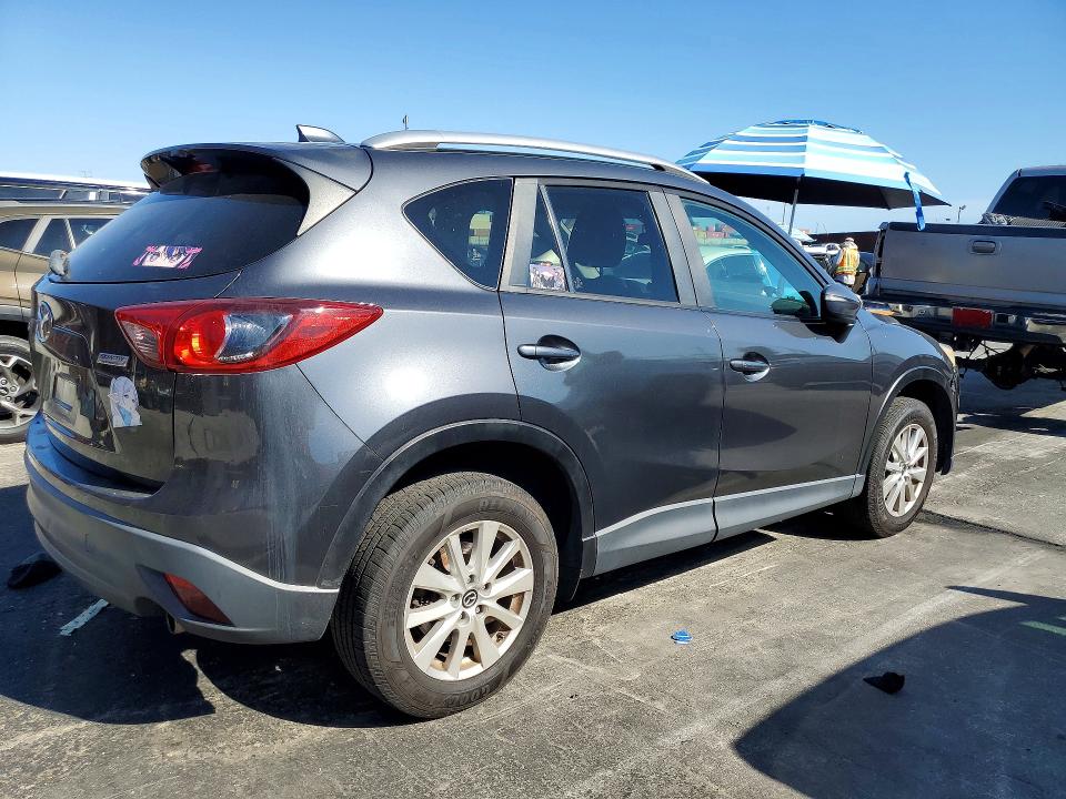 Photo 3 from auction – 2015 MAZDA CX-5 with VIN JM3KE2CY7F0543028