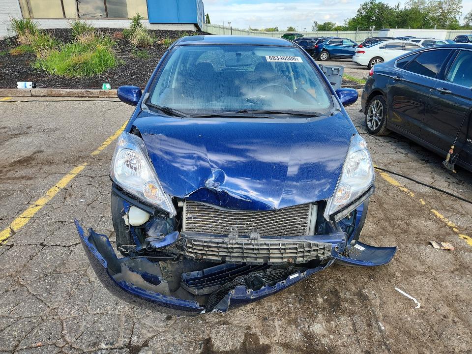 Photo 5 from auction – 2009 HONDA FIT with VIN JHMGE88439S002881