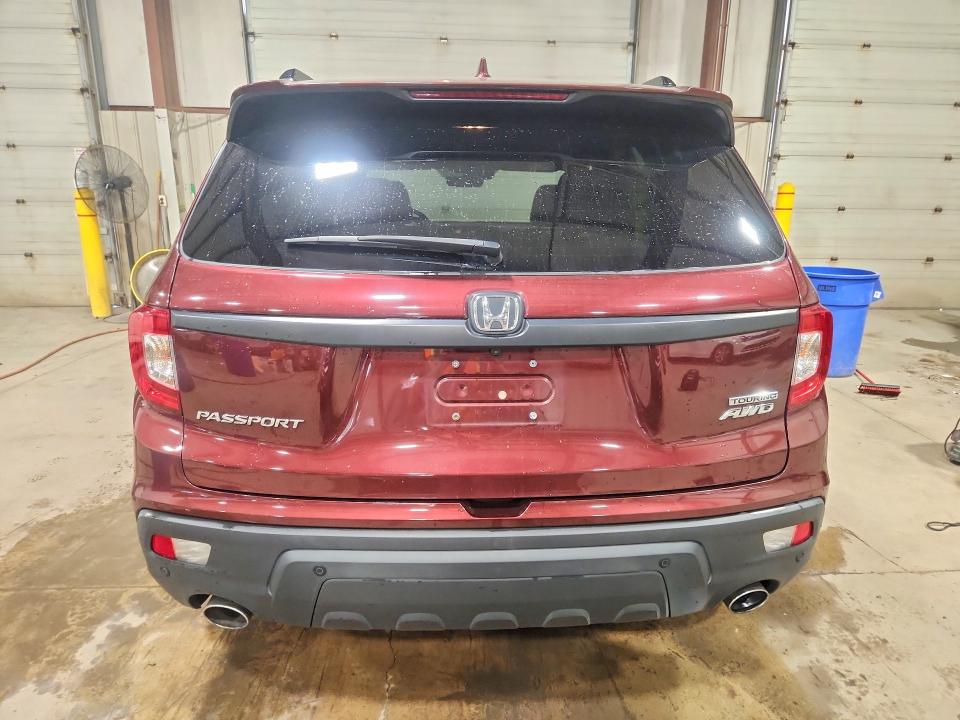Photo 6 from auction – 2021 HONDA PASSPORT with VIN 5FNYF8H98MB029093