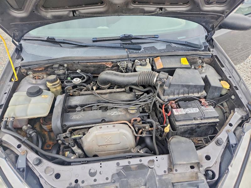 Фото 11 с аукциона – 2002 FORD FOCUS с VIN 3FAHP37382R219202