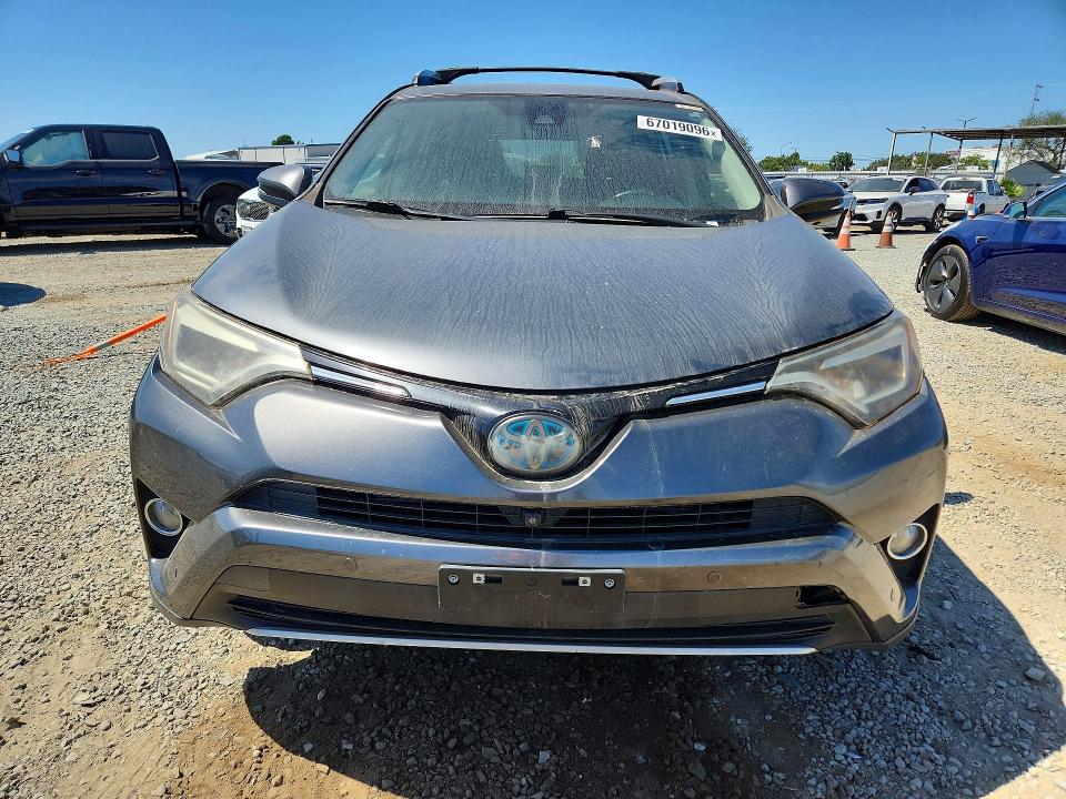 Фото 5 с аукциона – 2016 TOYOTA RAV4 HV с VIN JTMDJREV3GD043192
