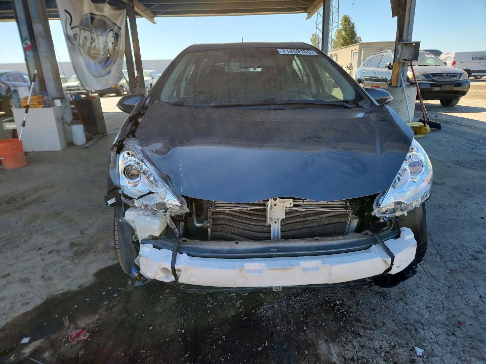 Photo 5 from auction – 2014 TOYOTA PRIUS C with VIN JTDKDTB30E1062800