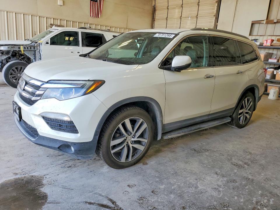 HONDA PILOT 2017 with VIN 5FNYF6H94HB025844 - Photo from auction