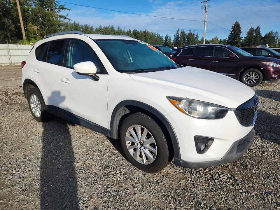 Photo 4 from auction – 2014 MAZDA CX-5 with VIN JM3KE4CY3E0375933