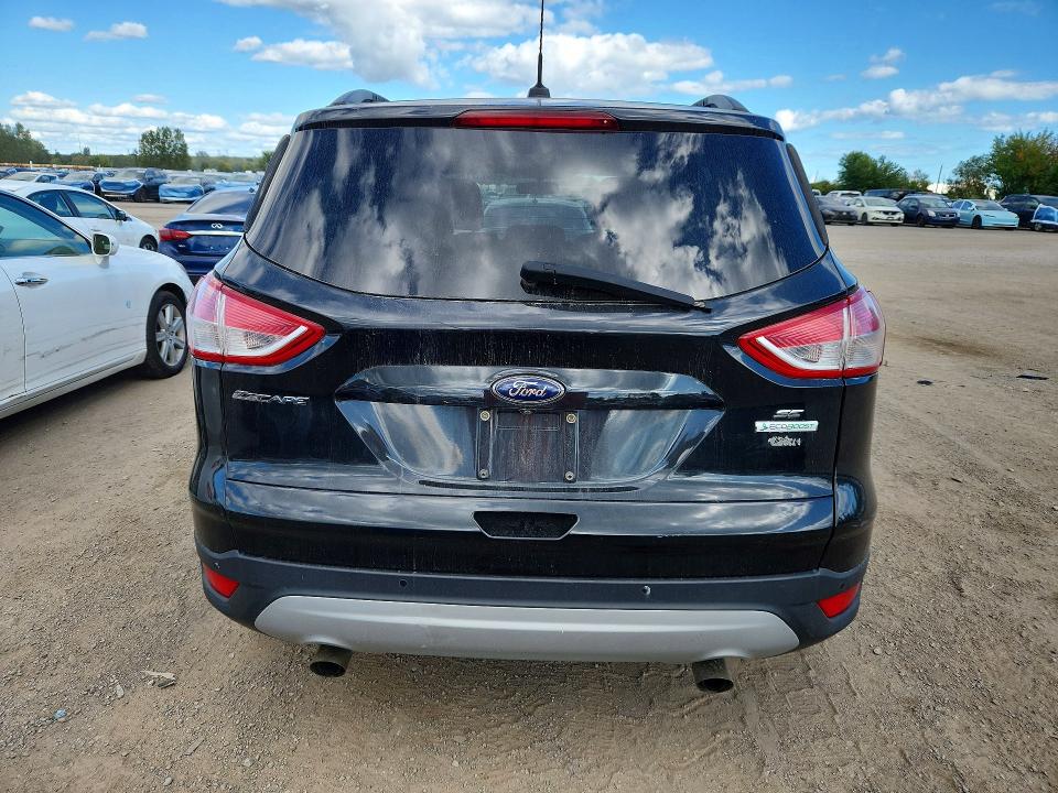 Photo 6 from auction – 2015 FORD ESCAPE with VIN 1FMCU0GXXFUB85854