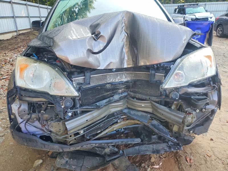 Снимка 12 от търг – 2011 HONDA CR-V с VIN 5J6RE4H41BL094912