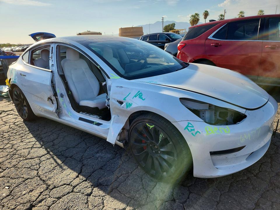 Photo 4 from auction – 2022 TESLA MODEL 3 with VIN 5YJ3E1EC7NF128641
