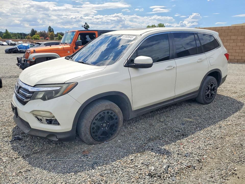 HONDA PILOT 2016 with VIN 5FNYF6H5XGB030526 - Photo from auction