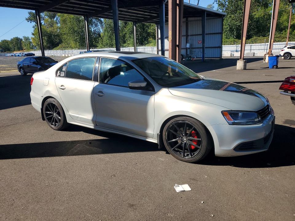 Photo 4 from auction – 2011 VOLKSWAGEN JETTA with VIN 3VWLL7AJ4BM124368
