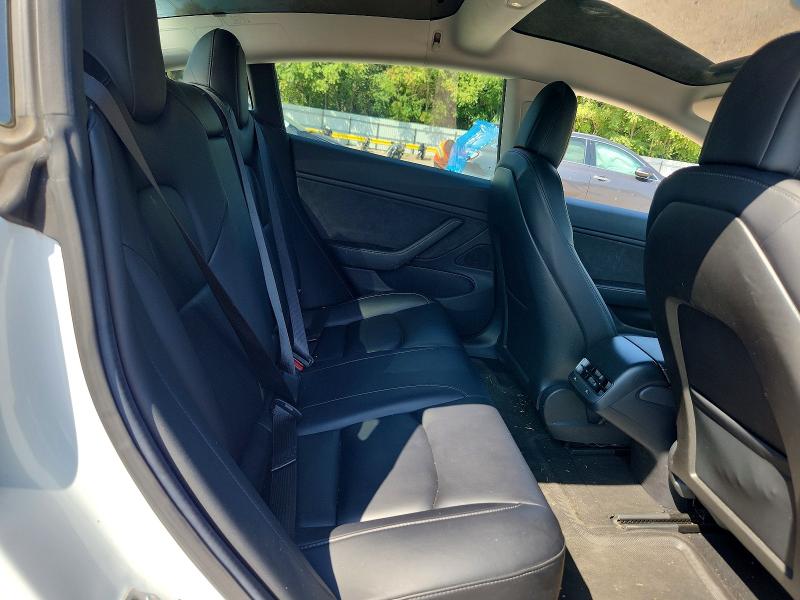 Photo 10 from auction – 2018 TESLA MODEL 3 with VIN 5YJ3E1EA7JF019637
