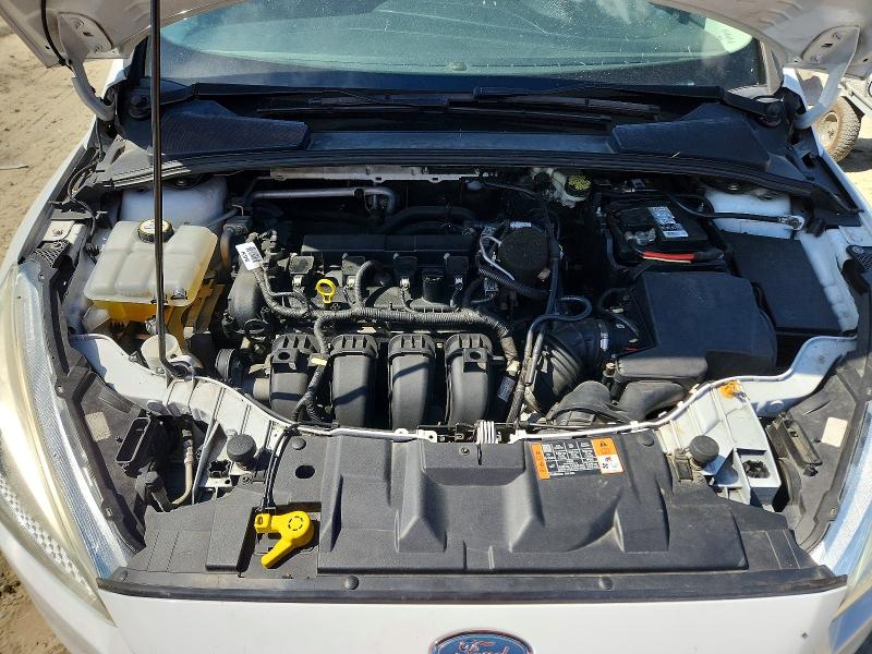 Photo 11 from auction – 2015 FORD FOCUS with VIN 1FADP3F27FL317567