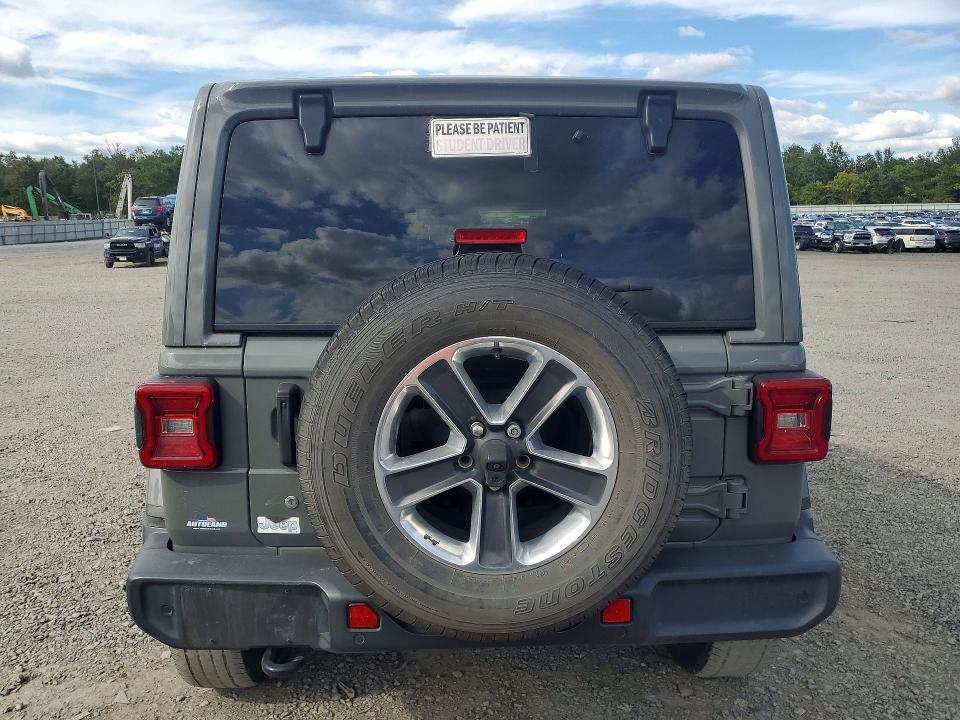 Снимка 6 от търг – 2019 JEEP WRANGLER UNLIMITED с VIN 1C4HJXENXKW505119