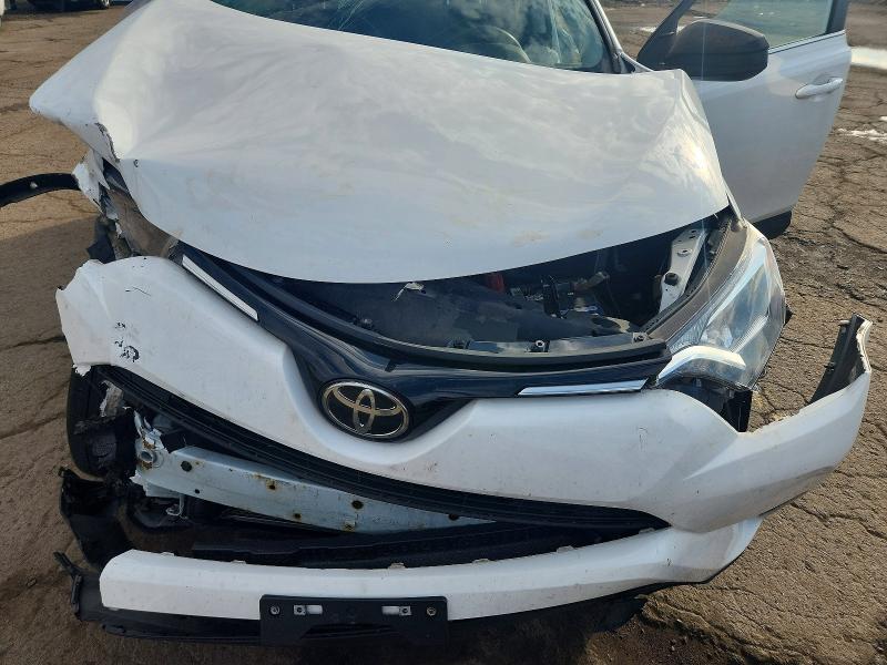 Photo 11 from auction – 2018 TOYOTA RAV4 with VIN 2T3BFREV3JW757620