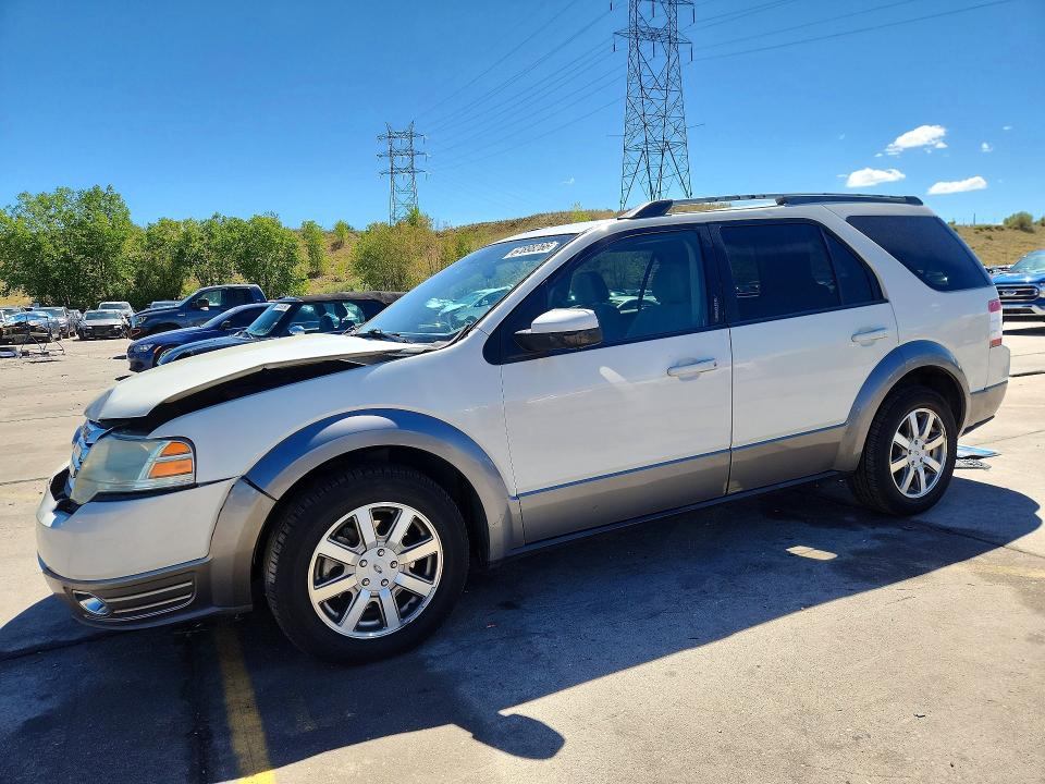 FORD TAURUS X 2009 with VIN 1FMDK02W19GA01445 - Photo from auction