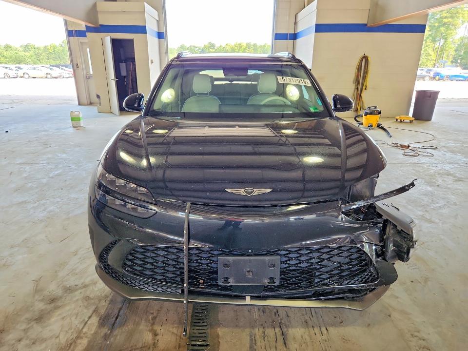 Photo 5 from auction – 2023 GENESIS GV60 with VIN KMUKCDTC6PU018273