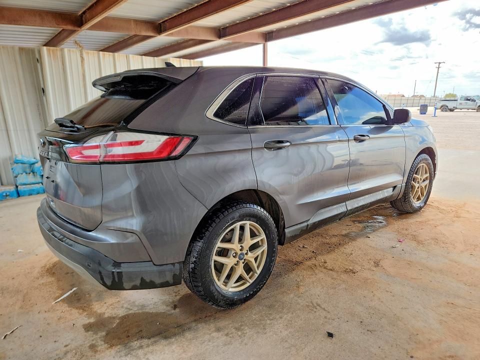 Photo 3 from auction – 2021 FORD EDGE with VIN 2FMPK3J9XMBA21333