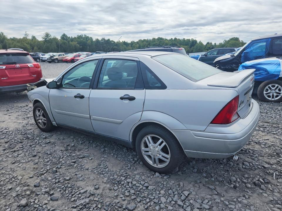 Снимка 2 от търг – 2003 FORD FOCUS с VIN 1FAFP34P73W257579