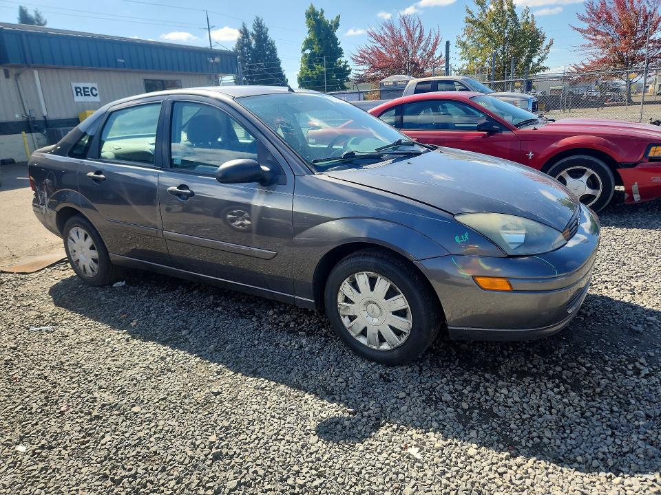 Photo 4 from auction – 2004 FORD FOCUS with VIN 1FAHP34394W149925