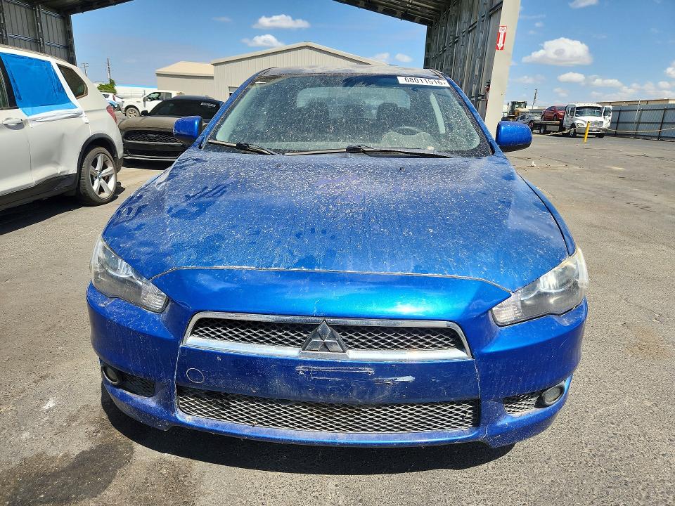 Photo 5 from auction – 2011 MITSUBISHI LANCER with VIN JA32U8FW5BU026076