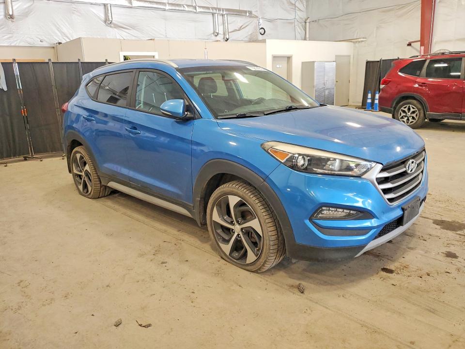 Foto 4 de la subasta – 2017 HYUNDAI TUCSON con VIN KM8J3CA27HU433103