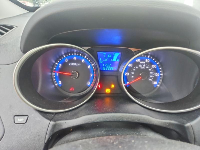 Photo 9 from auction – 2011 HYUNDAI TUCSON with VIN KM8JU3AC2BU172878
