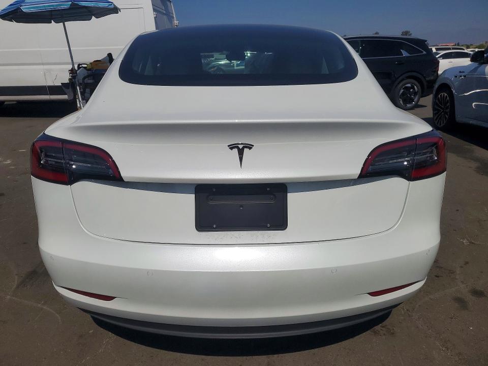 Фото 6 с аукциона – 2022 TESLA MODEL 3 с VIN 5YJ3E1EA0NF125983