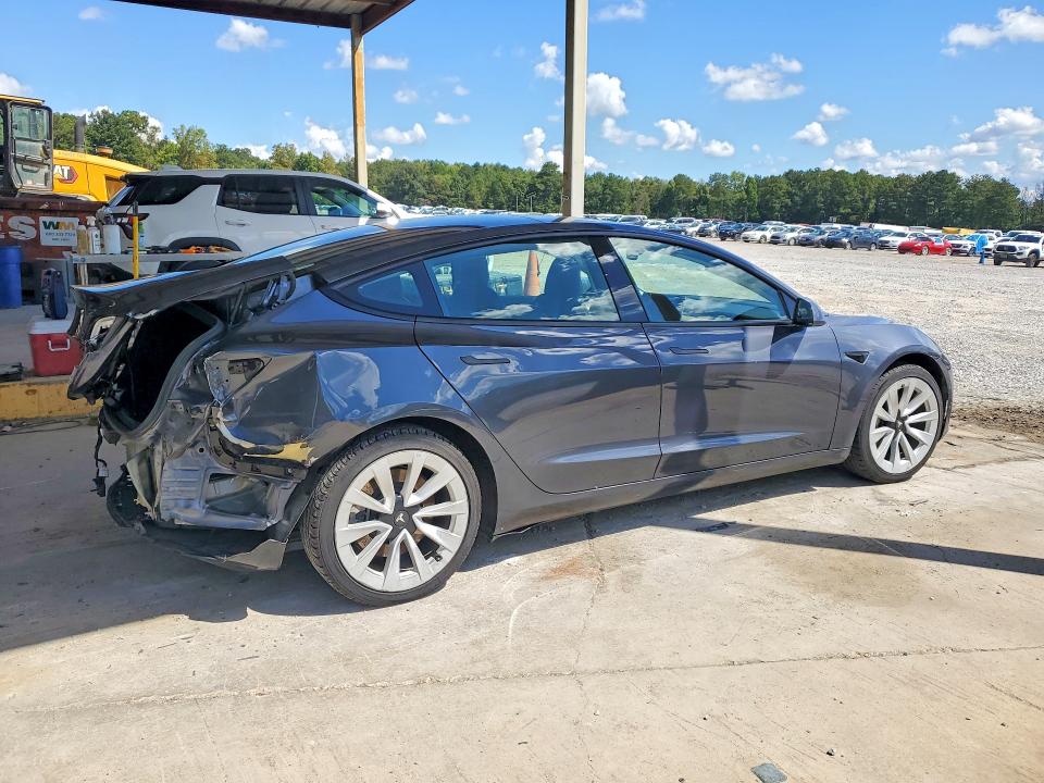 Снимка 3 от търг – 2022 TESLA MODEL 3 с VIN 5YJ3E1EA2NF370039