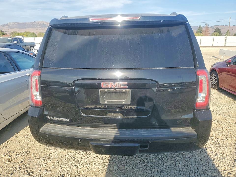 Photo 6 from auction – 2019 GMC YUKON with VIN 1GKS1BKC2KR118319