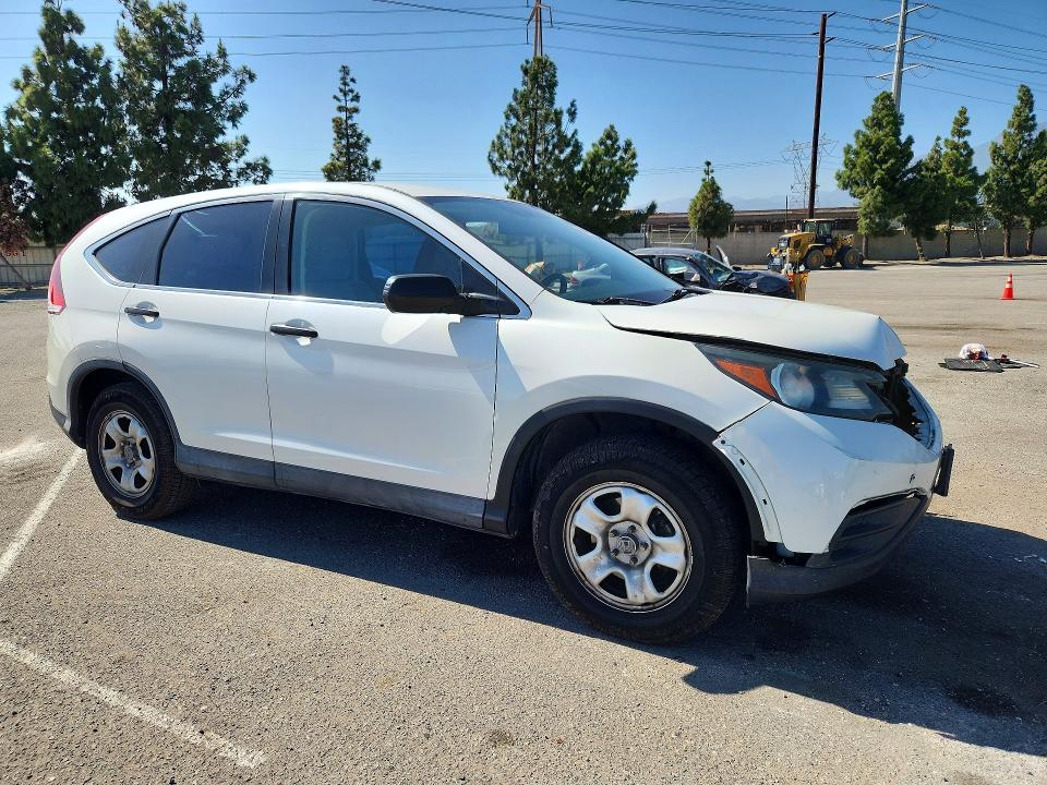 Photo 4 from auction – 2014 HONDA CR-V with VIN 5J6RM3H31EL040809