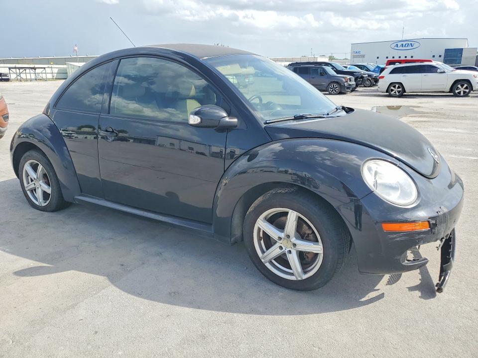 Photo 4 from auction – 2010 VOLKSWAGEN NEW BEETLE with VIN 3VWPG3AG6AM035709