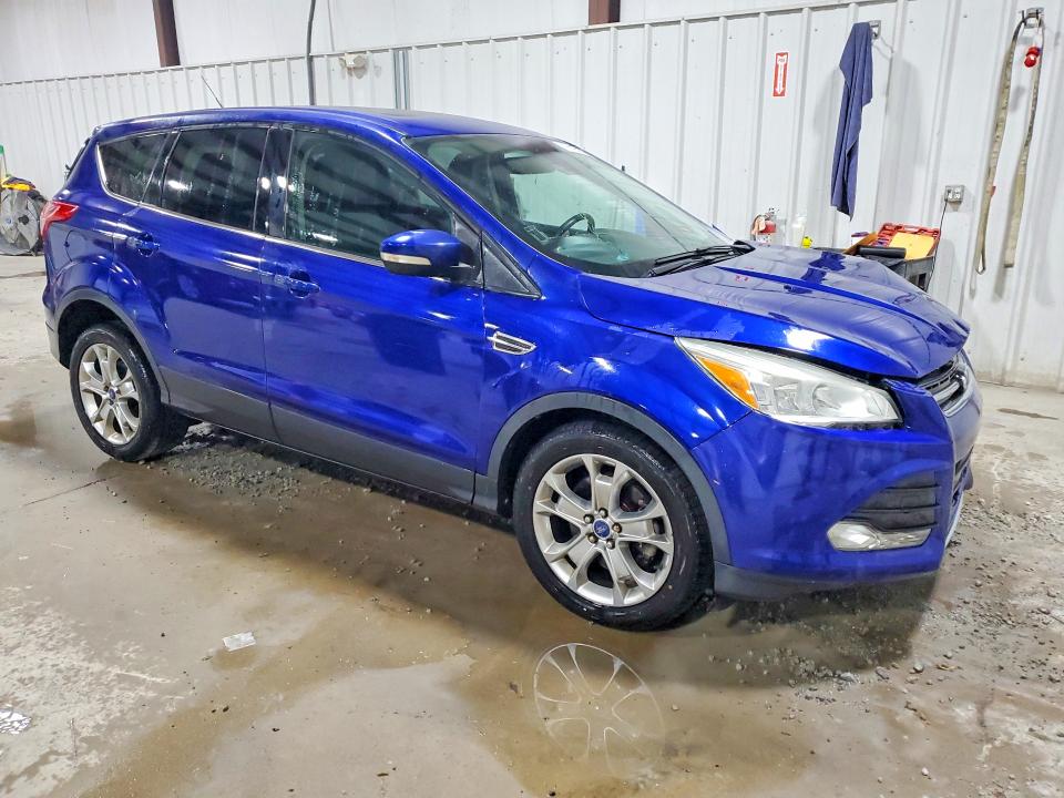 Photo 4 from auction – 2013 FORD ESCAPE with VIN 1FMCU9H95DUD40442