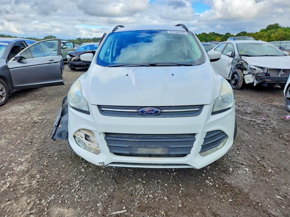 Снимка 5 от търг – 2016 FORD ESCAPE с VIN 1FMCU9GX4GUB02411