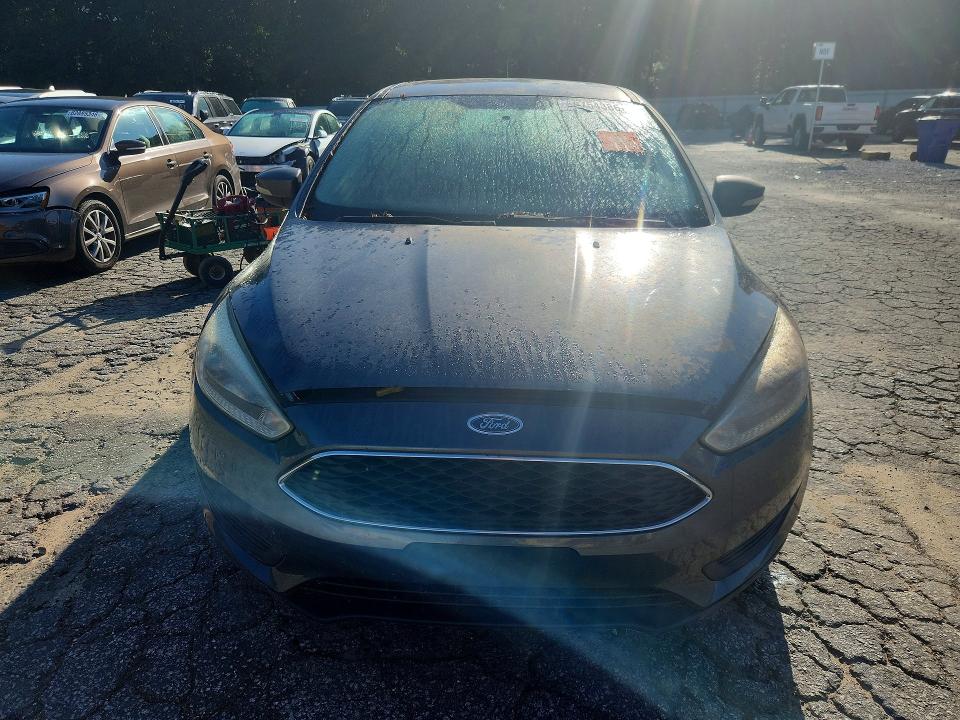 Снимка 5 от търг – 2016 FORD FOCUS с VIN 1FADP3F29GL355044
