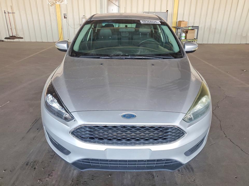 Снимка 5 от търг – 2016 FORD FOCUS с VIN 1FADP3F21GL254449