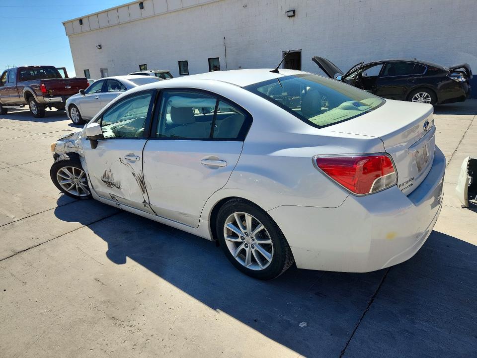Фото 2 с аукциона – 2014 SUBARU IMPREZA с VIN JF1GJAB67EH019274