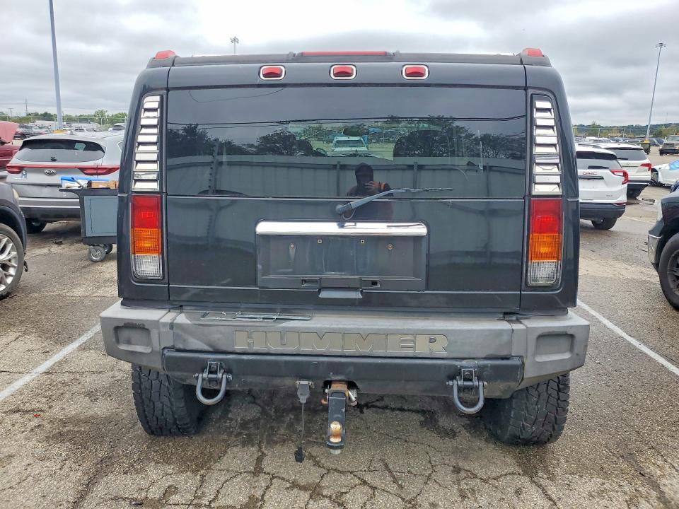 Фото 6 с аукциона – 2004 HUMMER H2 с VIN 5GRGN23U24H100200