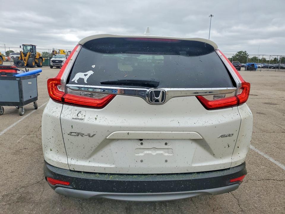 Photo 6 from auction – 2018 HONDA CR-V with VIN 2HKRW2H88JH624614