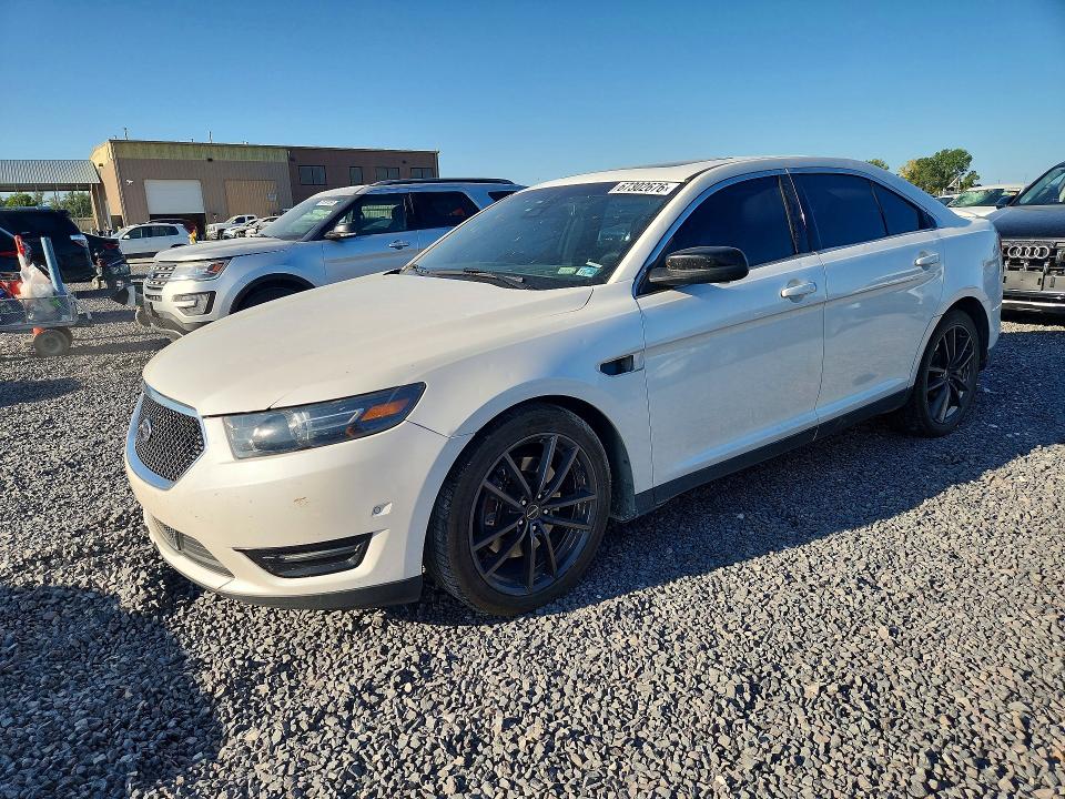 FORD TAURUS 2016 with VIN 1FAHP2KT8GG134120 - Photo from auction