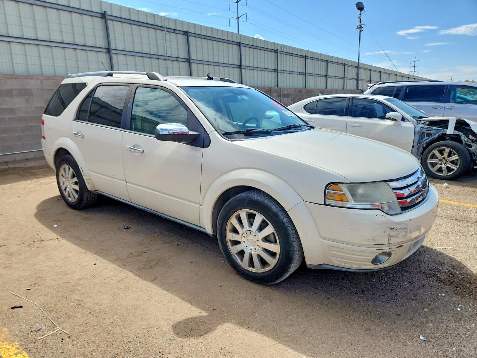 Photo 4 from auction – 2009 FORD TAURUS X with VIN 1FMDK03W79GA02226