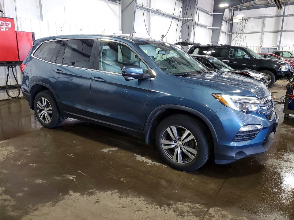 Photo 4 from auction – 2017 HONDA PILOT with VIN 5FNYF6H66HB052372