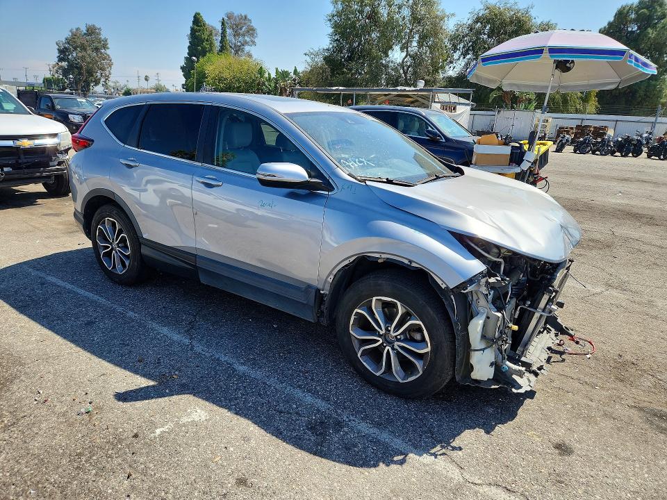 Photo 4 from auction – 2021 HONDA CR V with VIN 7FARW1H87ME021588