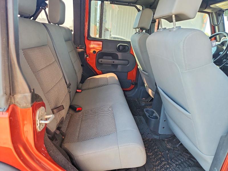 Photo 10 from auction – 2009 JEEP WRANGLER UNLIMITED with VIN 1J4GA691X9L749677