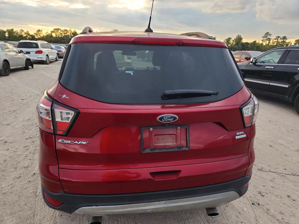 Photo 6 from auction – 2018 FORD ESCAPE with VIN 1FMCU0HD8JUD36395