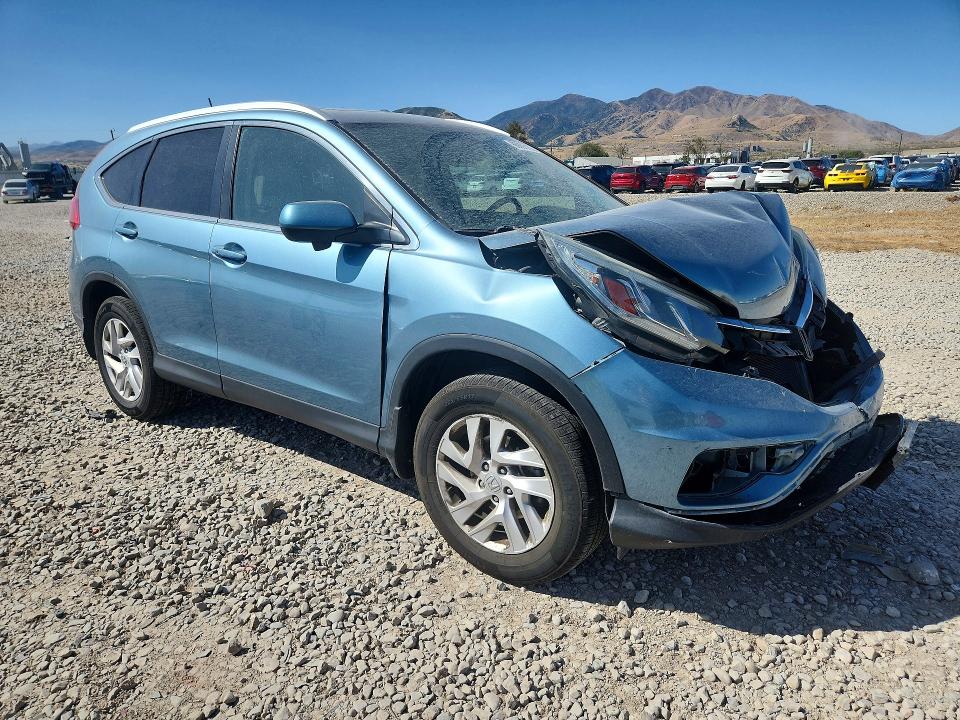 Photo 4 from auction – 2016 HONDA CR-V with VIN 2HKRM4H79GH634411