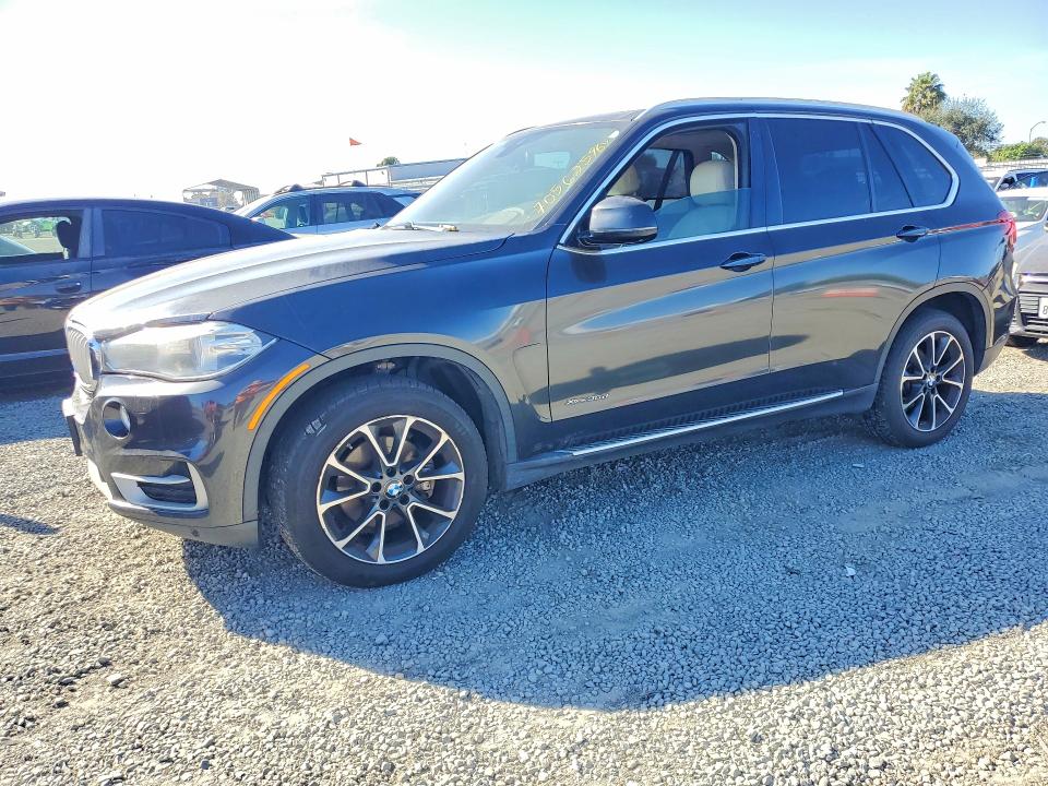 BMW X5 2014 with VIN 5UXKS4C59E0C07335 - Photo from auction