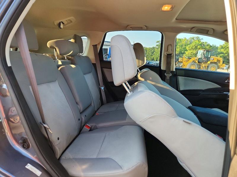 Photo 11 from auction – 2015 HONDA CR-V with VIN 2HKRM3H51FH548419