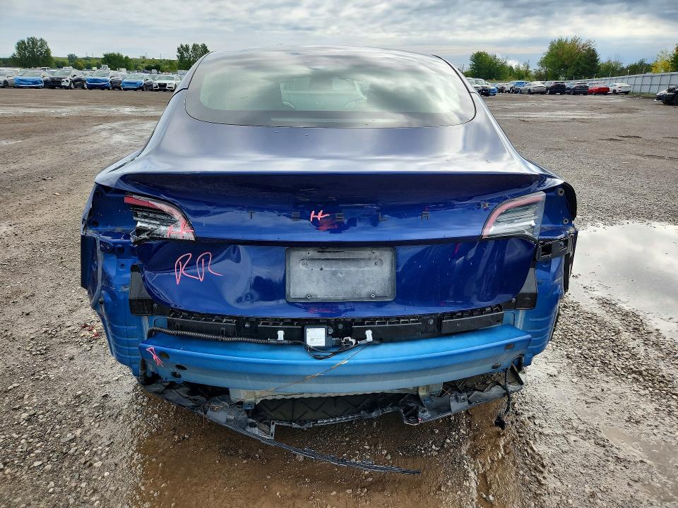 Foto 6 de la subasta – 2022 TESLA MODEL 3 con VIN 5YJ3E1EA7NF356394