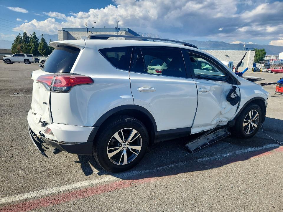 Photo 3 from auction – 2017 TOYOTA RAV4 with VIN 2T3RFREVXHW587698